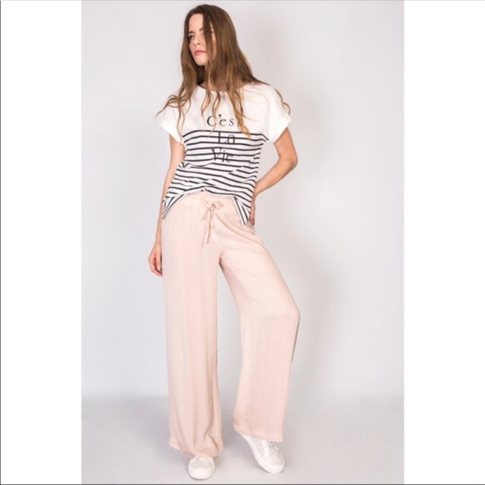 Cream color palazzo pants.